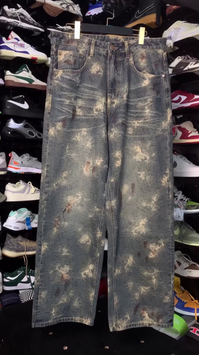 Distresed wide legged denim jeans